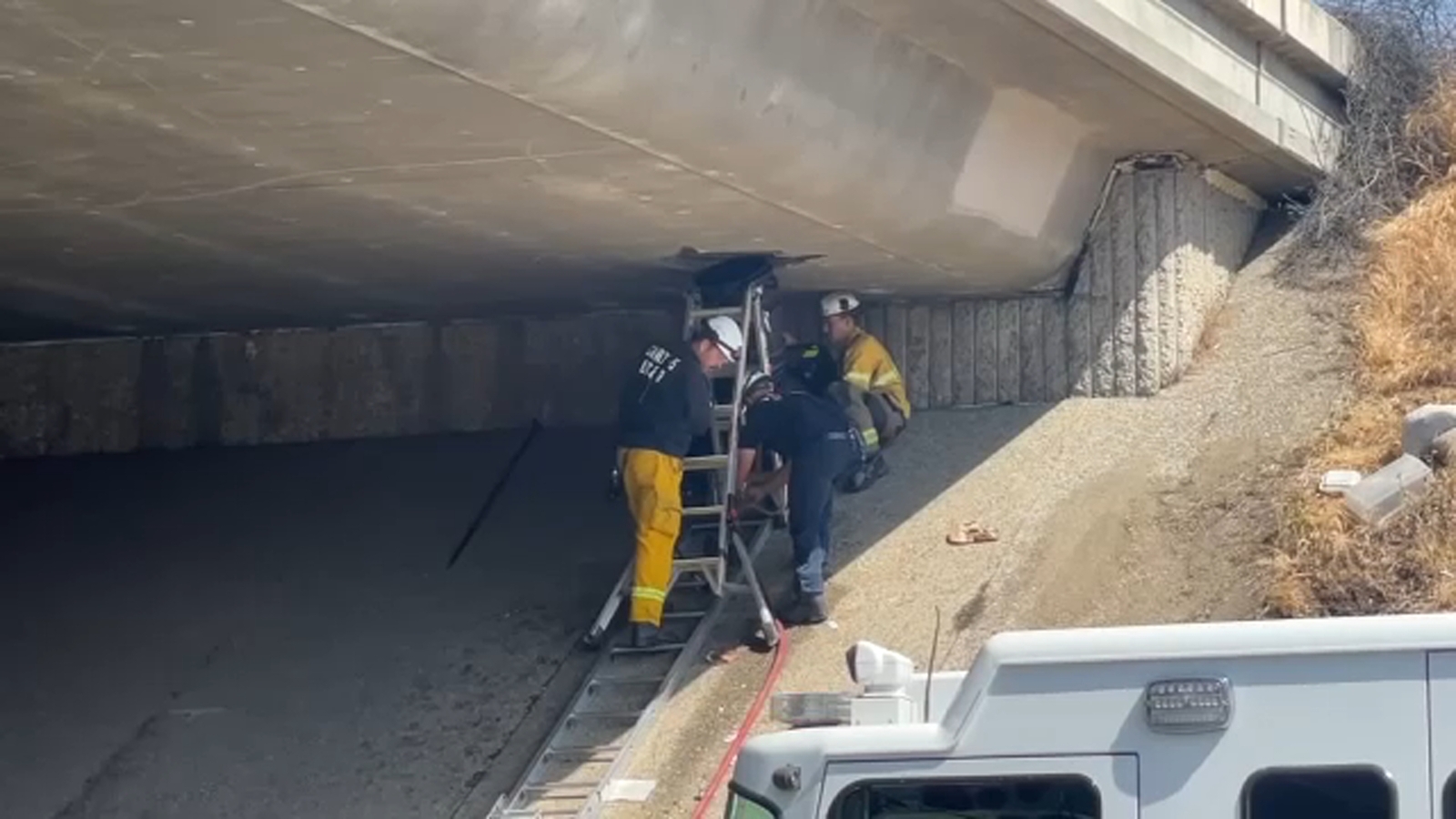 1 detained after fire found inside access hole on Highway 41