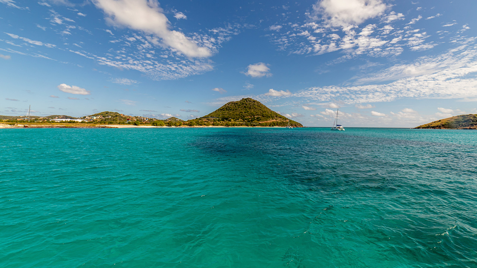Abandoned boat and 11 bodies found on eastern Caribbean island in St(01)