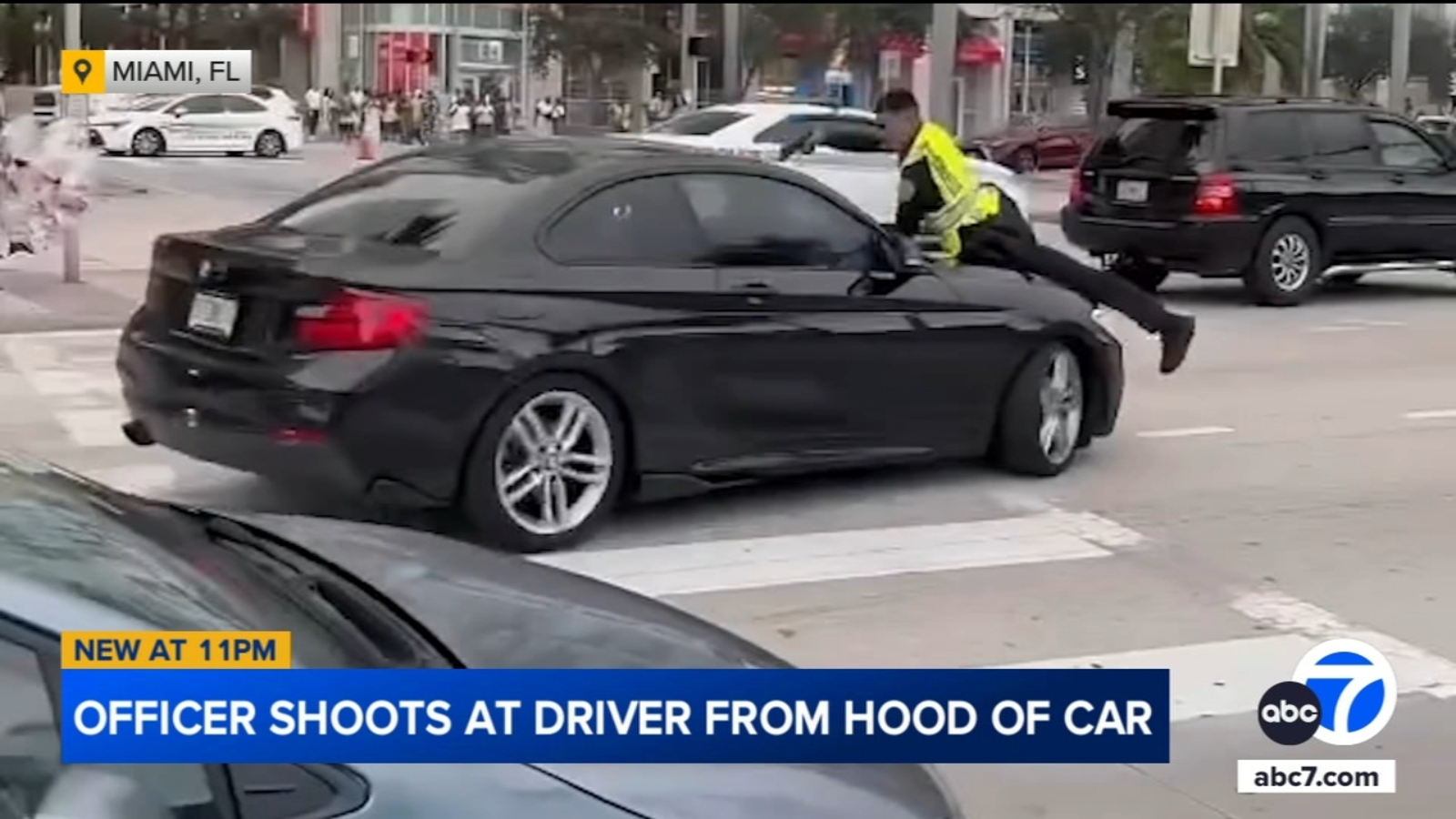 Miami cop shoots driver through windshield while clinging to hood of BMW