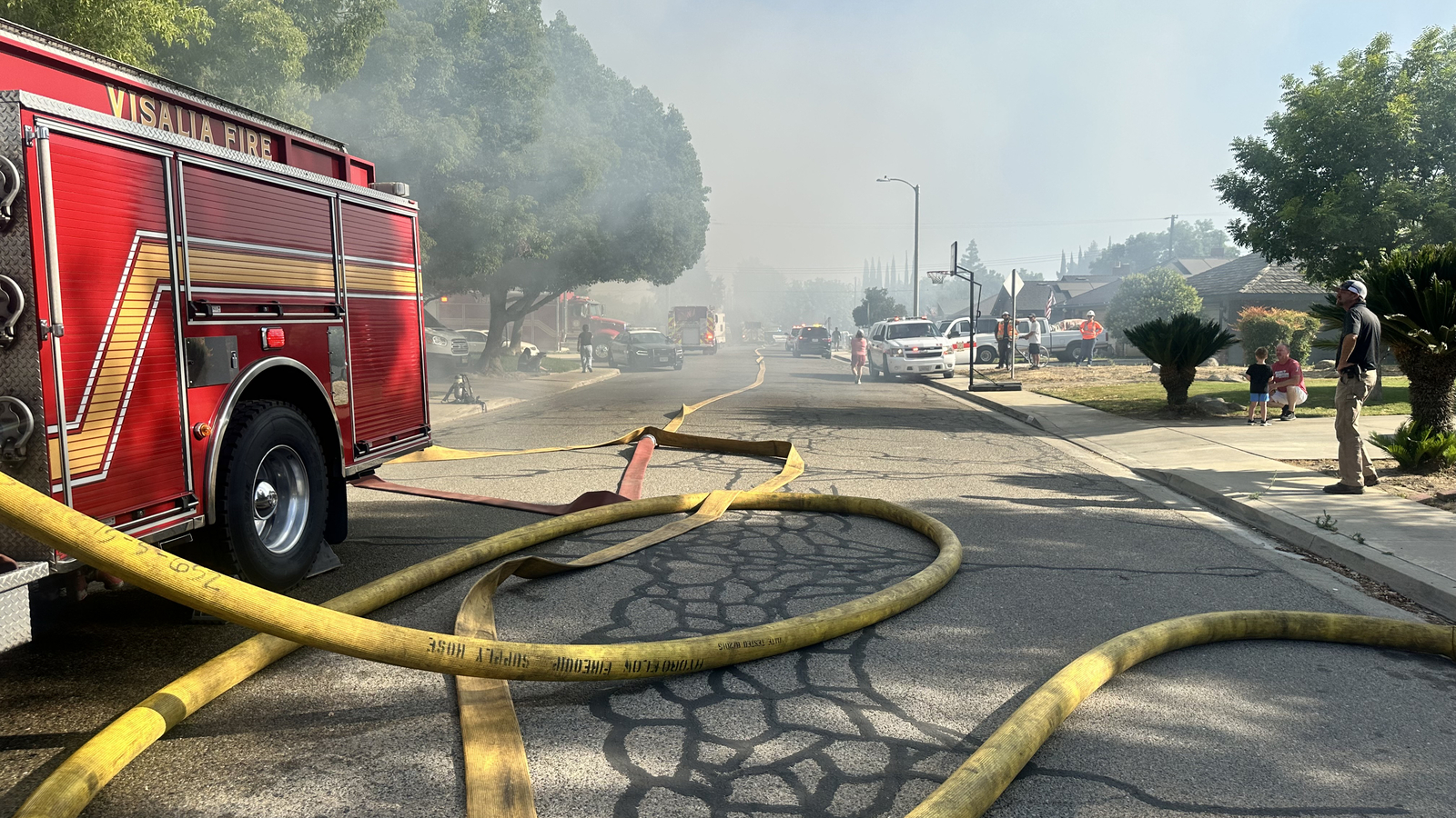 House fire in Visalia prompting evacuations and road closures