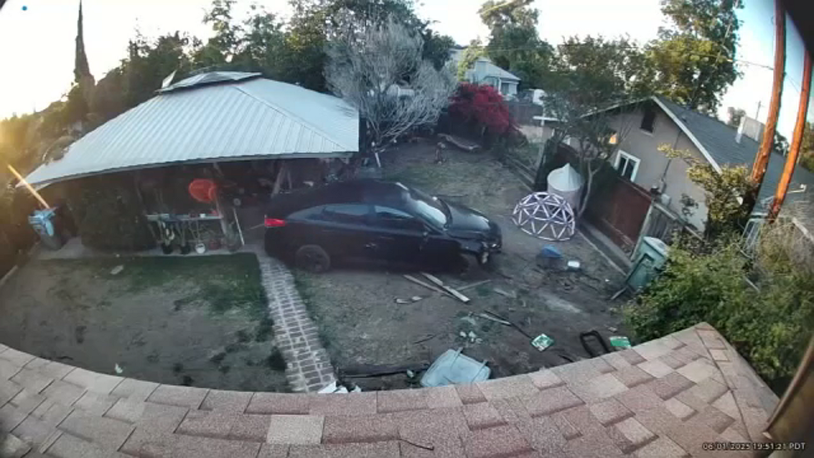 Video shows suspect in weekend standoff driving through fences, pointing gun at police