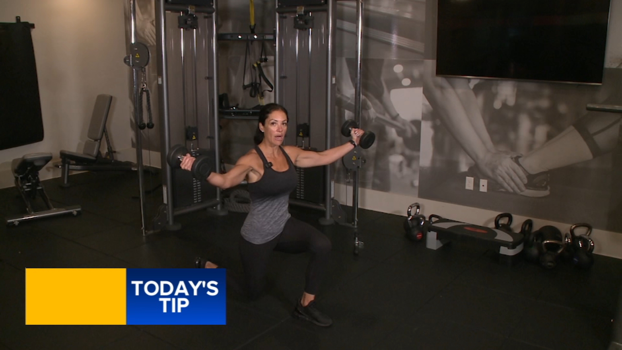 Fitness tip: Reverse lunge wih wide press
