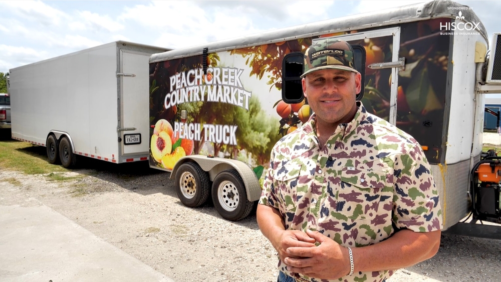 Off duty, this firefighter trades his uniform for fruit crates