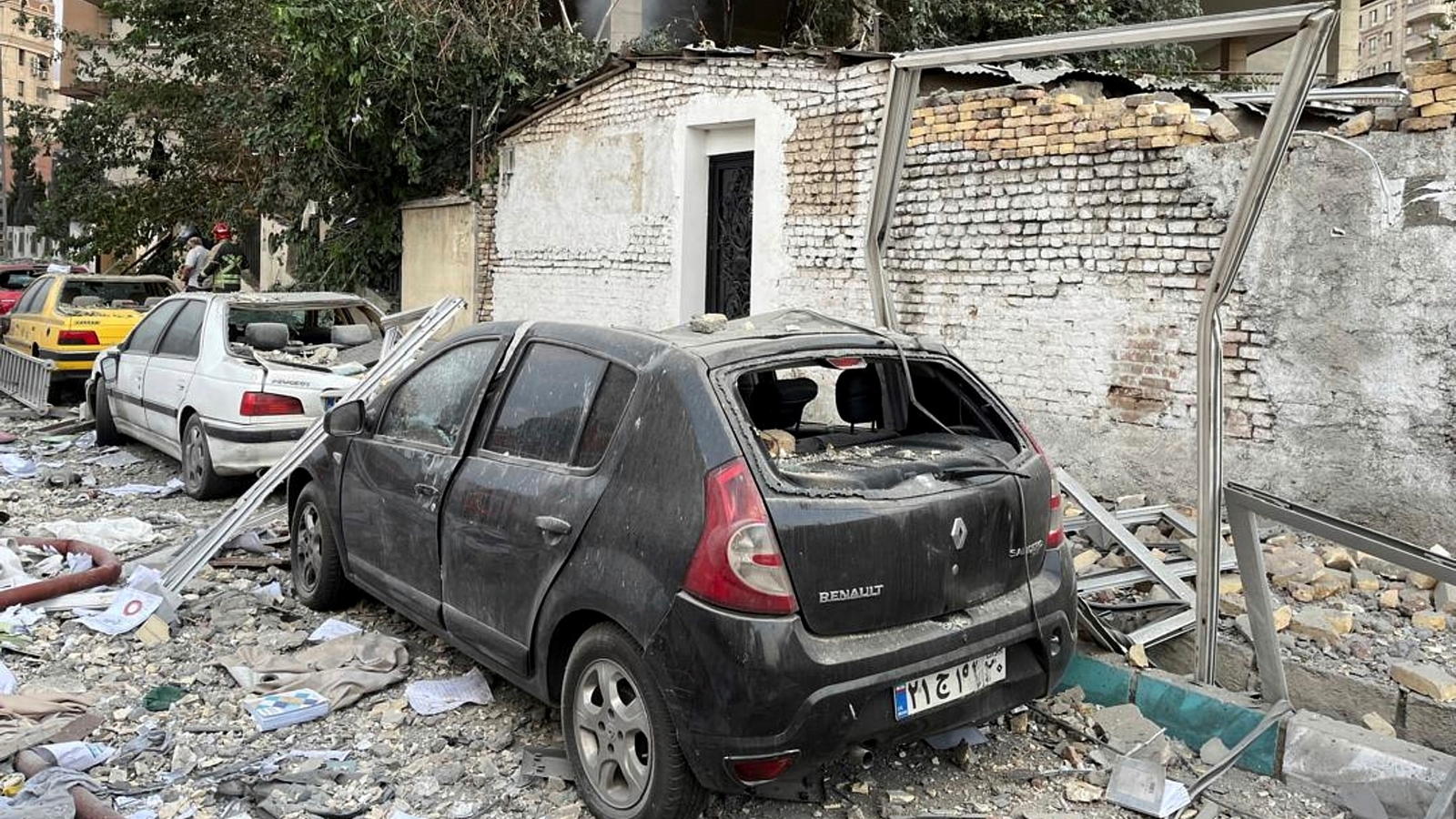 Israel says Iran has launched 100 drones as air raid sirens blare across country