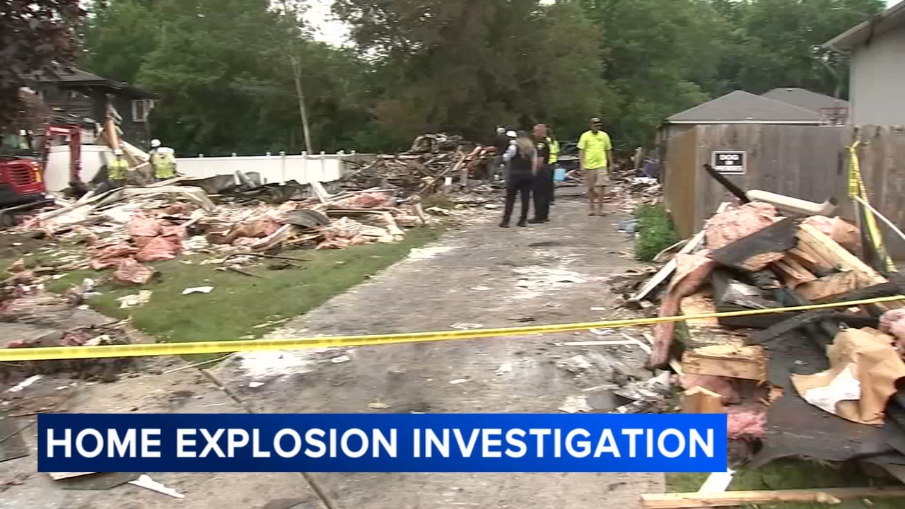 Investigation continues after body found in suburban house explosion