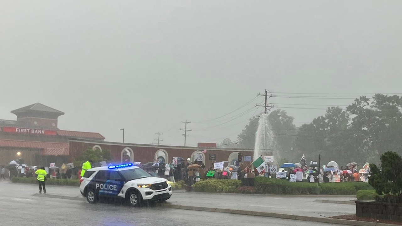 Rainy weather didn't keep demonstrators in Jacksonville from gathering Saturday,