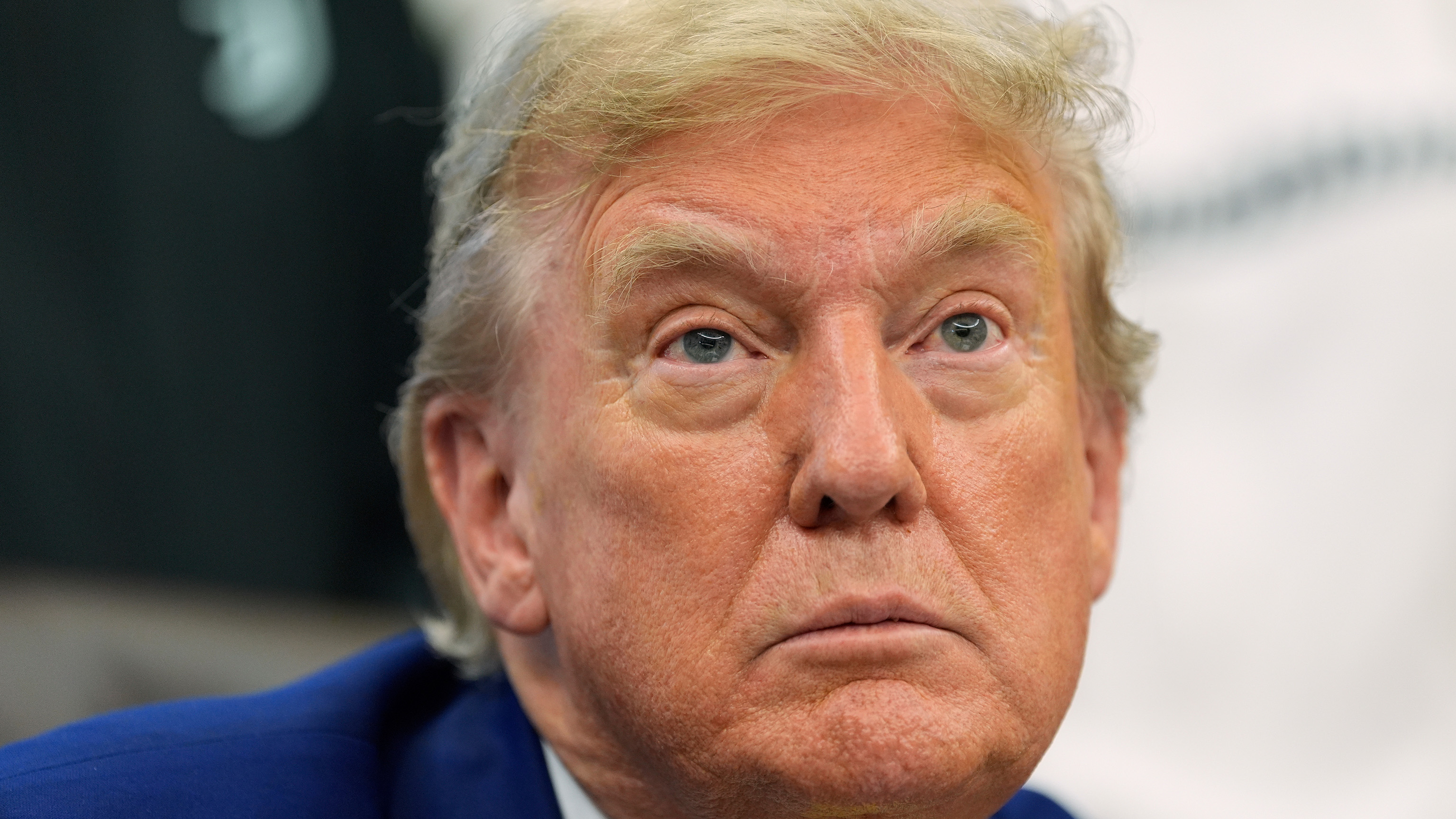 President Donald Trump talks with reporters as he meets with members of the Juventus soccer club in the Oval Office of the White House, Wednesday, June 18, 2025, in Washington.