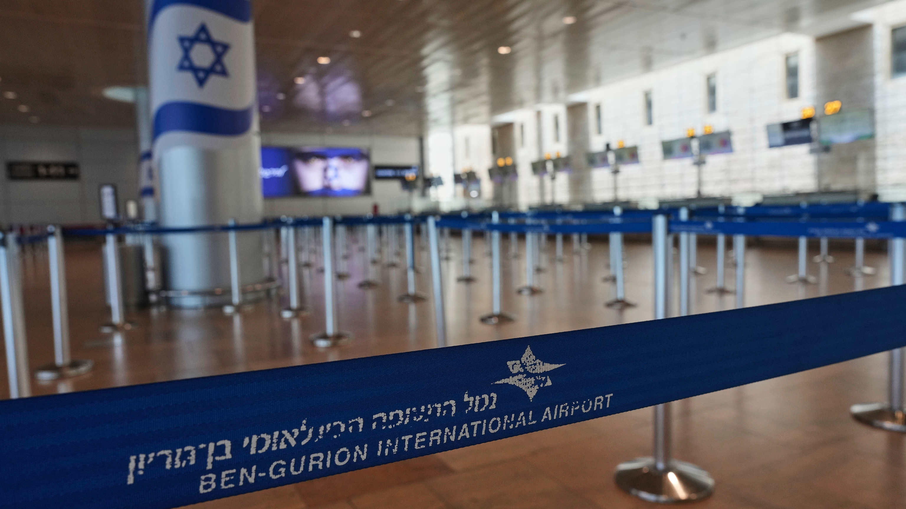 Israel's Ben Gurion Airport is empty of passengers following an Israeli military strike on Iran, near Tel Aviv, Israel, Friday, June 13, 2025.