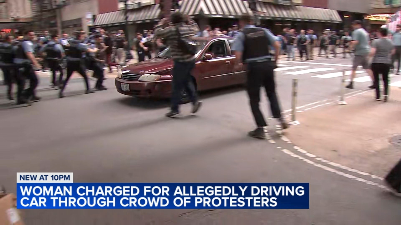 Woman charged with driving through large anti-ICE protest: CPD