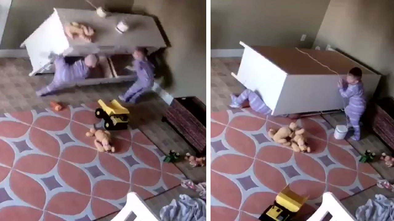 falling dresser Dresser falls on top of 2-year-old boy, sending twin brother to his rescue