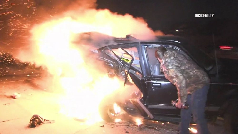 Photographer rescued driver from fiery crash
