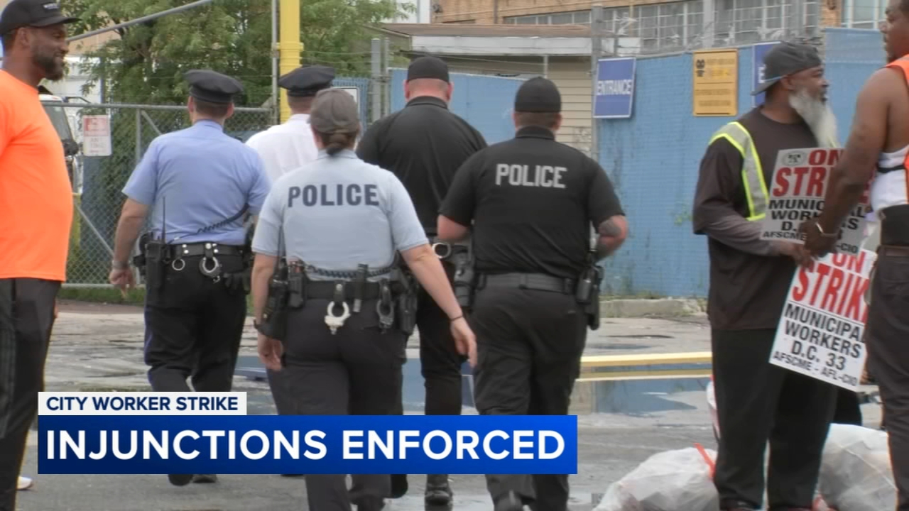 Tense moments as city workers picketed outside recycling facility
