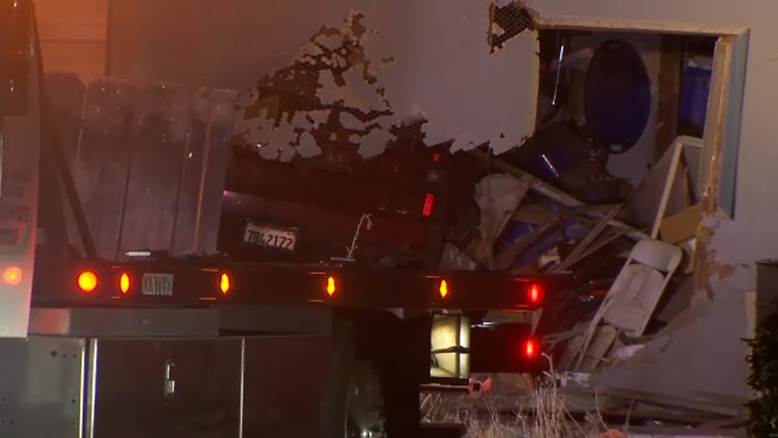 Family displaced after driver crashes stolen truck into central Fresno home, police say