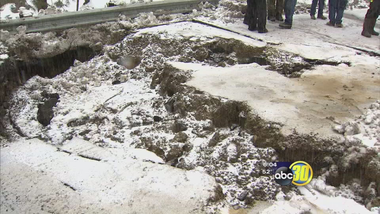 Runoff from rain and melting snow causing road washouts in mountain areas