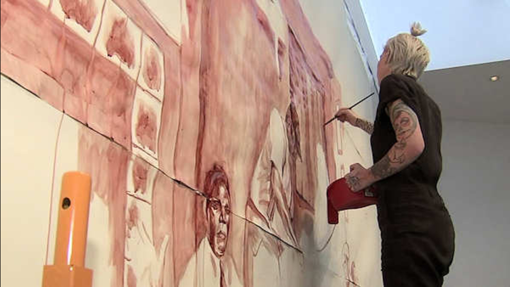 LA artist creates painting in blood as Trump protest