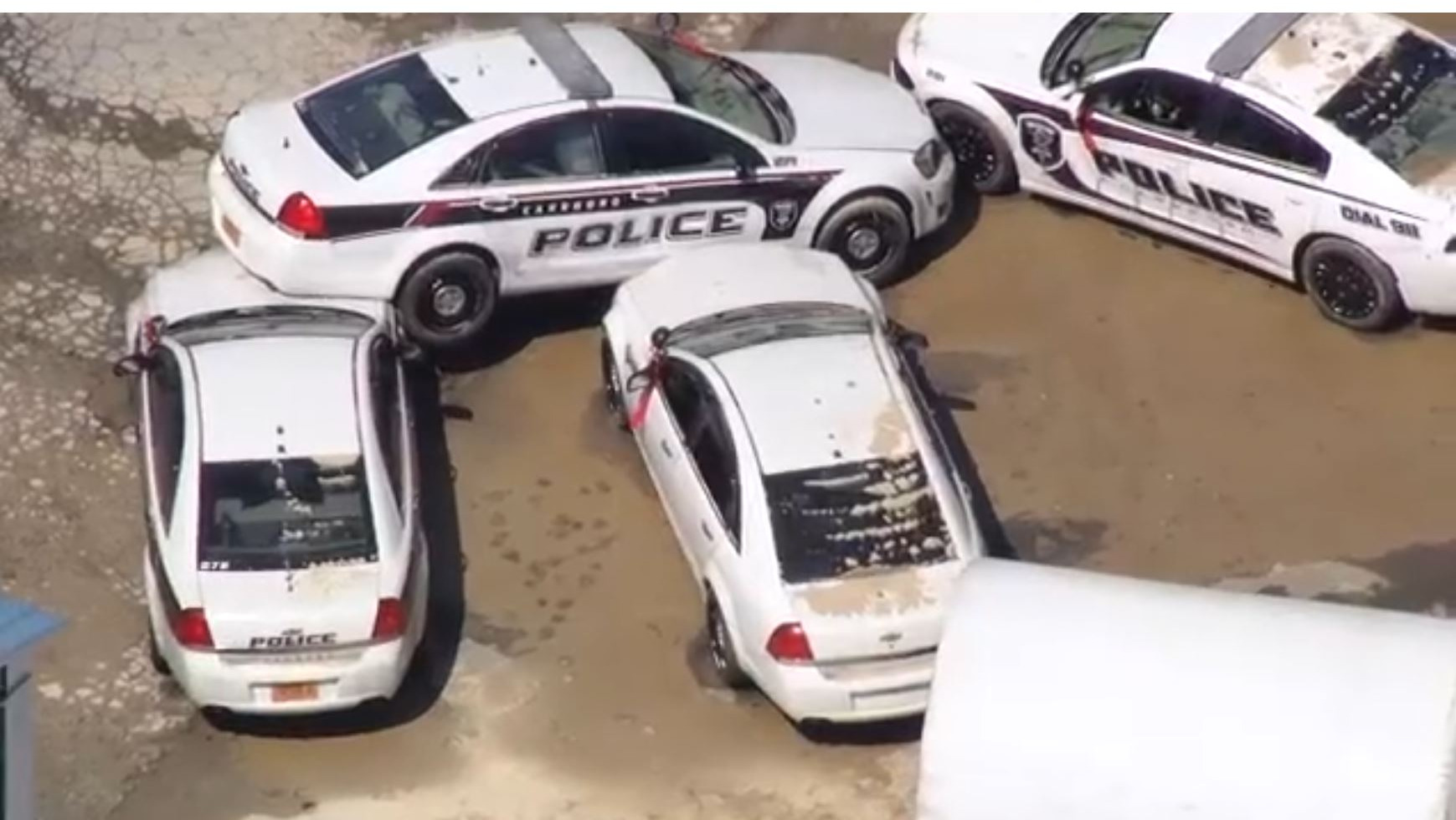 Flooded police cars in Carrboro