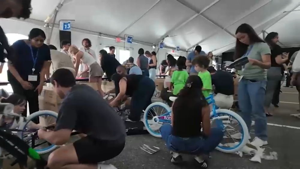 NJ medical students build bikes for local kids on the first day of class