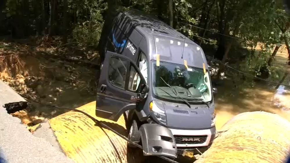 Amazon truck washed off road during flooding in Chatham County