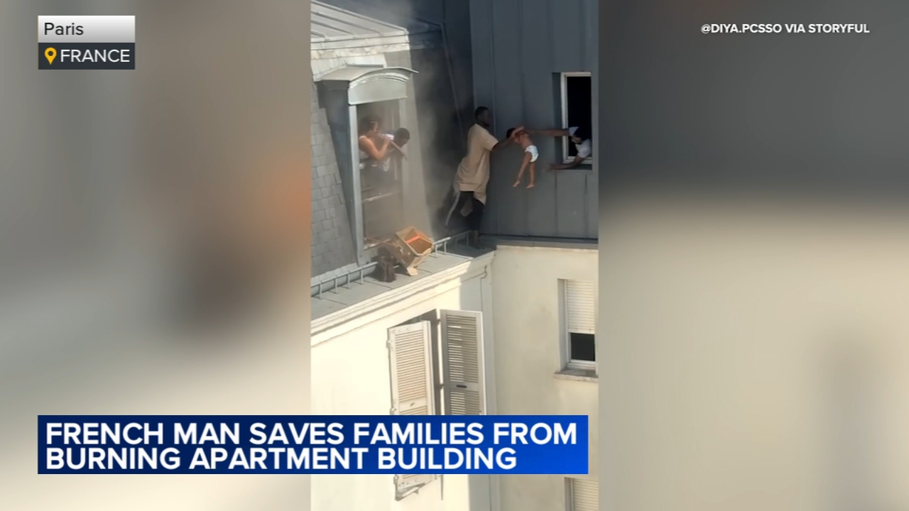 Hero Rescues Babies From Burning Apartment | VIDEO