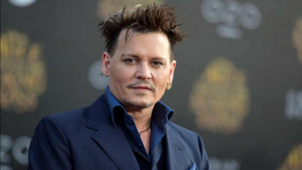 Johnny Depp suing former business manager