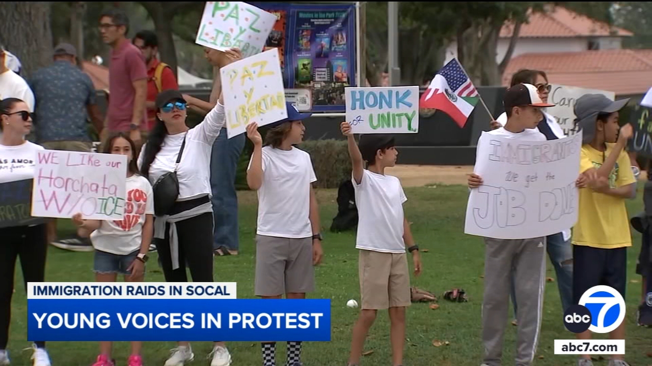 Children participate in protest in Alhambra decrying immigration raids