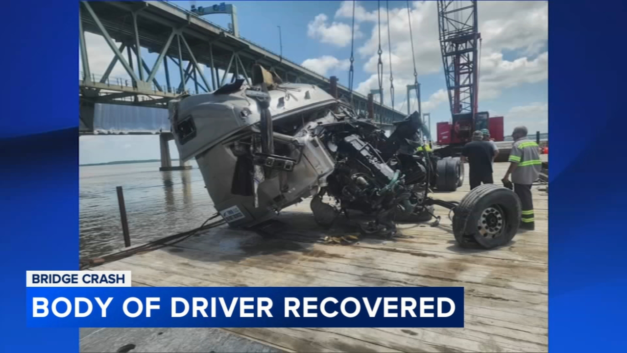 Body of driver recovered after semi truck cab plunges off bridge