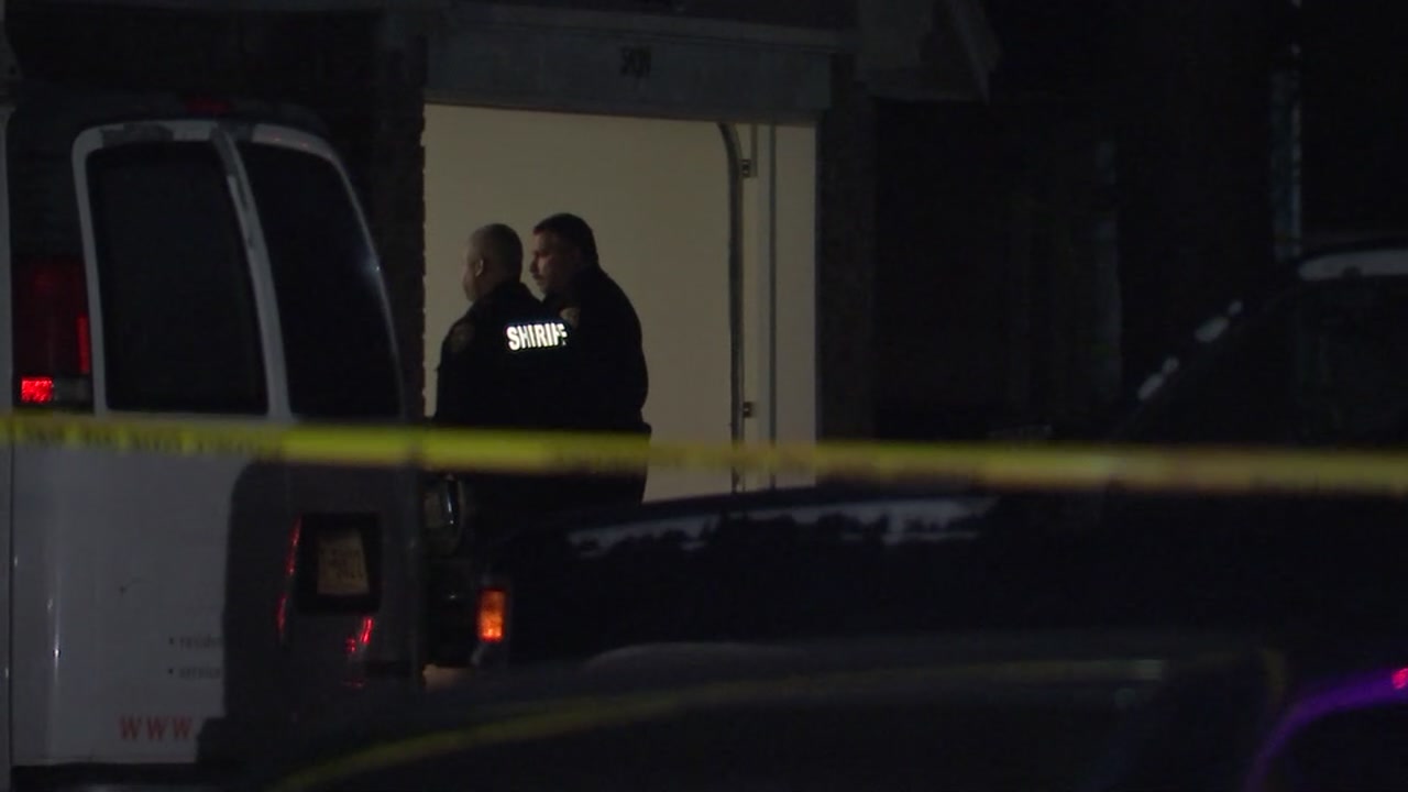 Teen finds father shot to death in their garage
