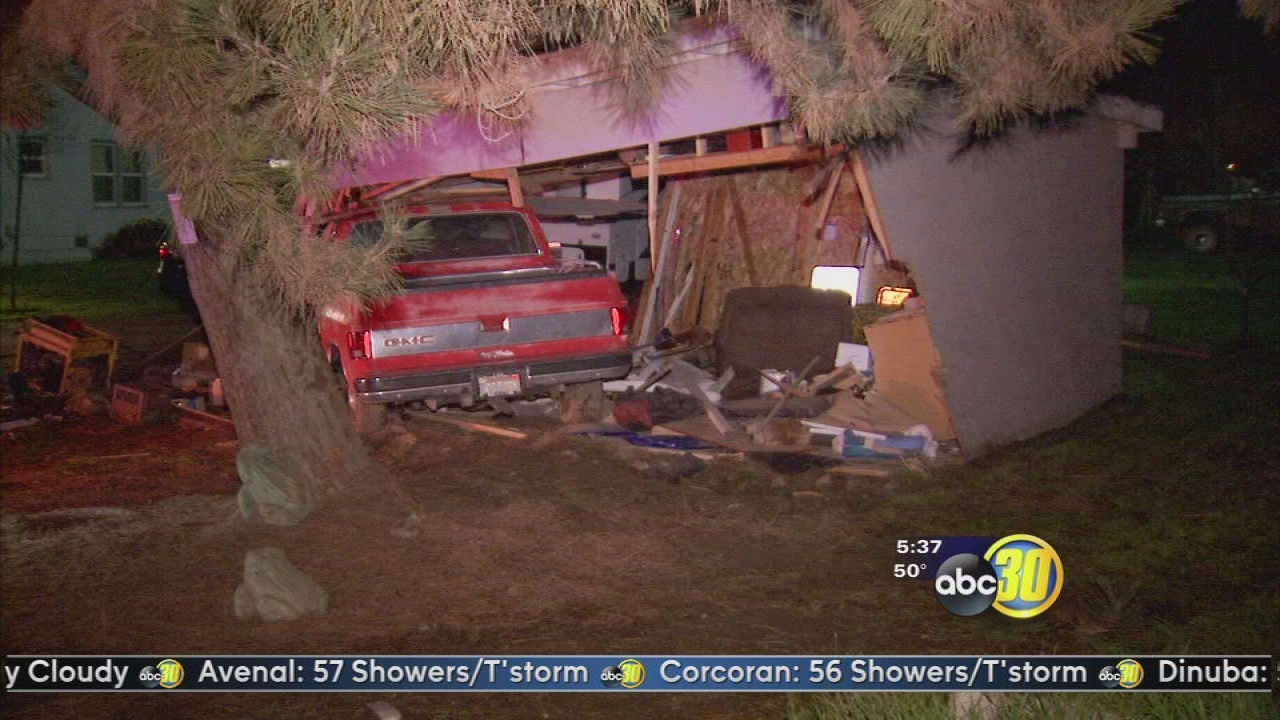 3 injured after crashing into garage near Hanford
