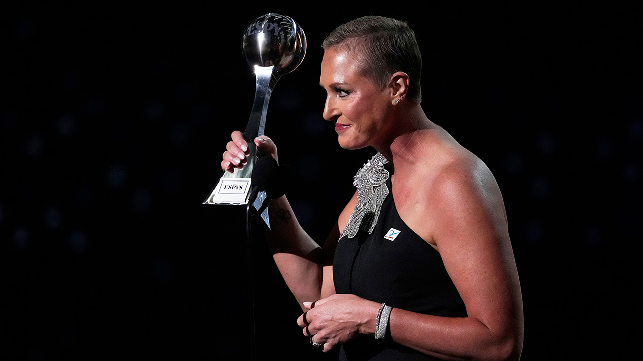 Katie Schumacher-Cawley accepts the Jimmy V Award for Perseverance at the ESPY Awards at the Dolby Theatre in Los Angeles, Wednesday, July 16, 2025.