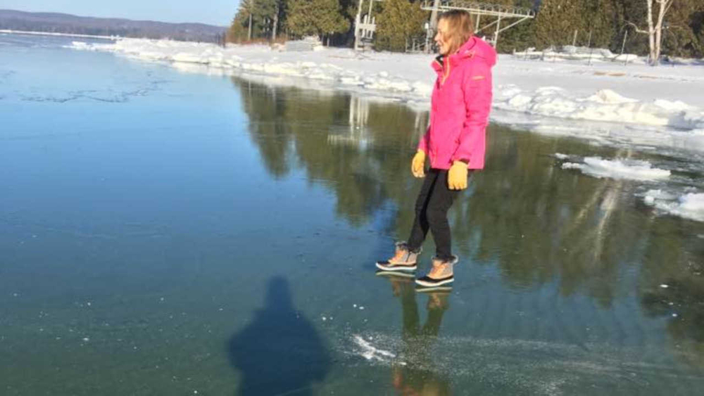 Michigan's Lake Charlevoix goes viral with crystal clear ice photos