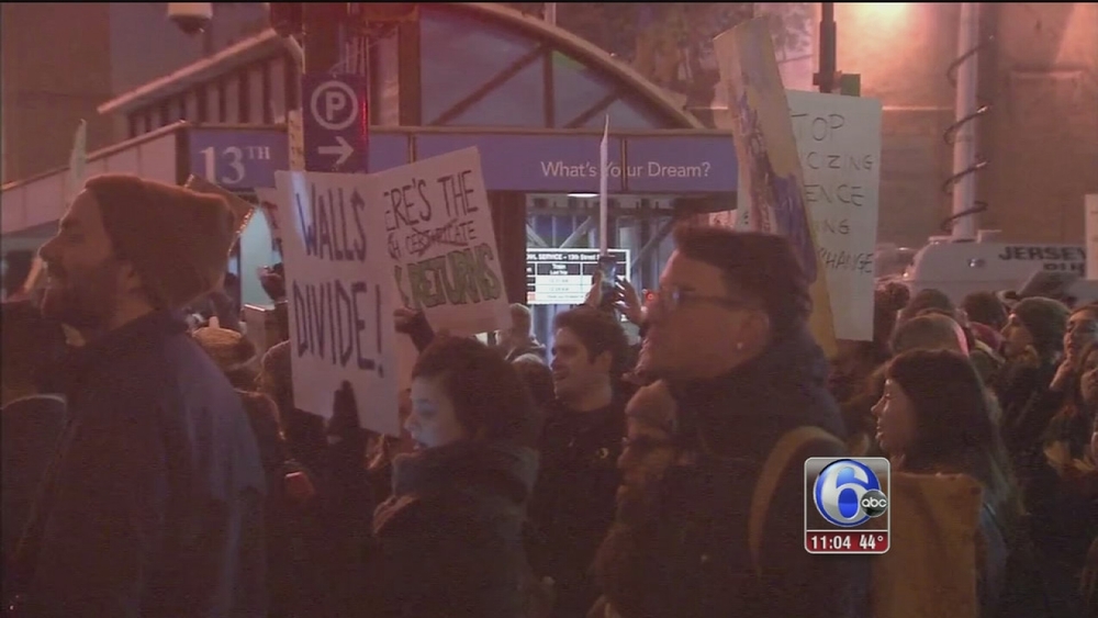 Marchers in Center City protest Donald Trump's visit