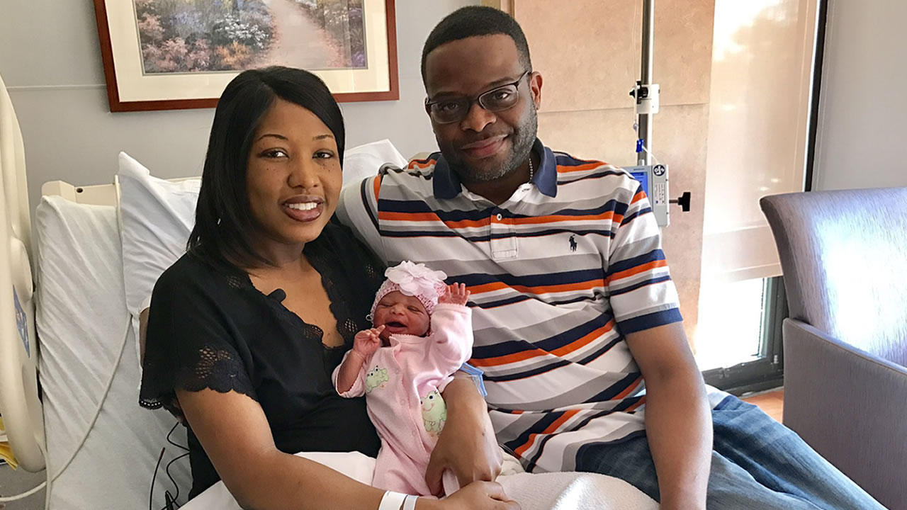 Mom, dad, baby daughter, all share same birthday