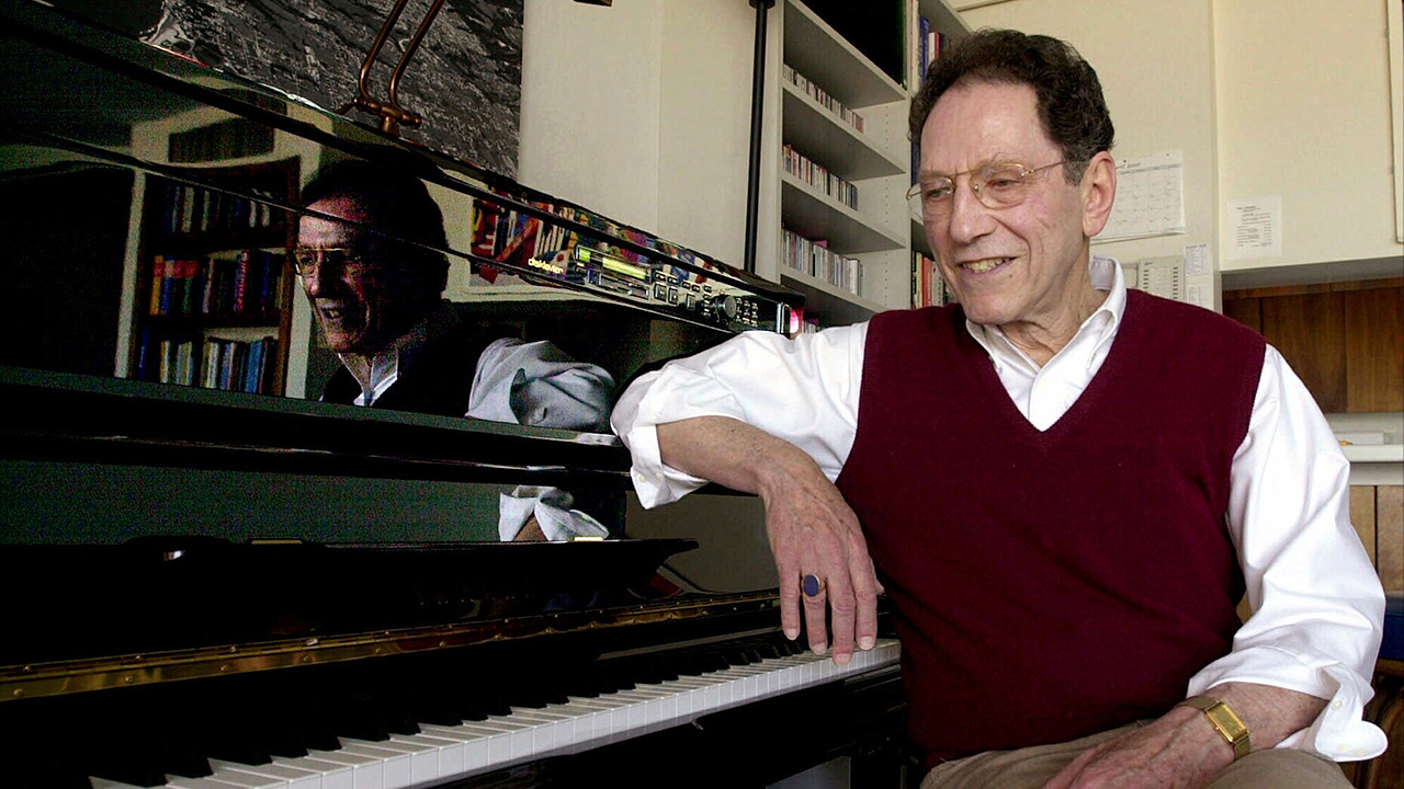 Musician Tom Lehrer sits beside the piano in his house in Santa Cruz, Calif., on April 21, 2000.