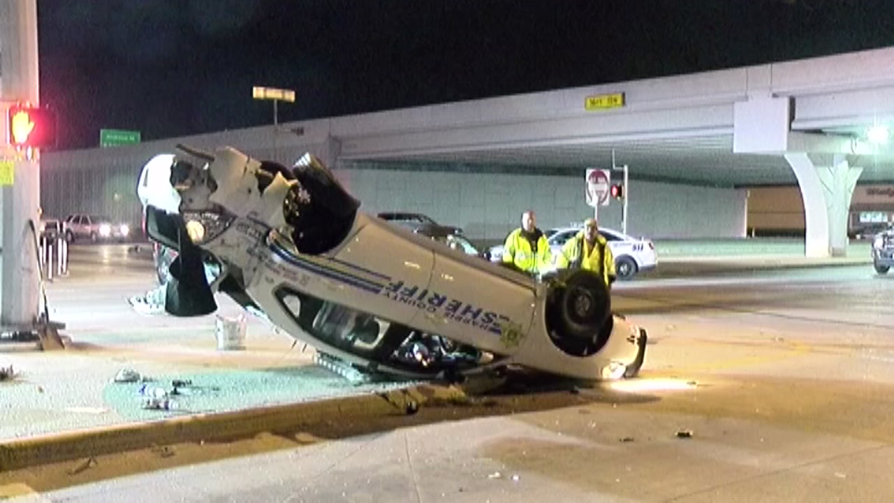 Crash flips deputy's patrol car