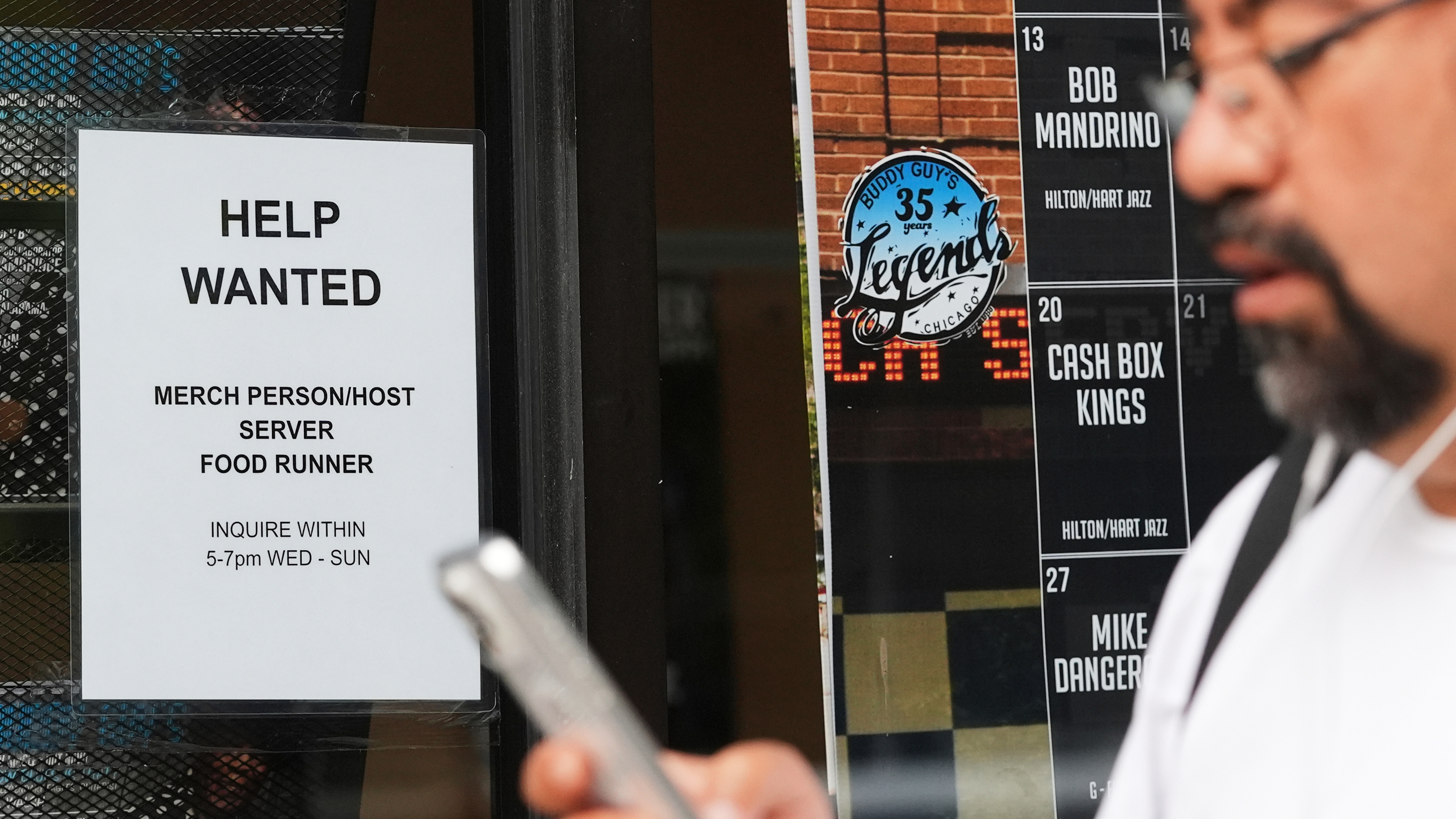 Help wanted sign is displayed at a live music and blues club in Chicago, Thursday, July 24, 2025. 
