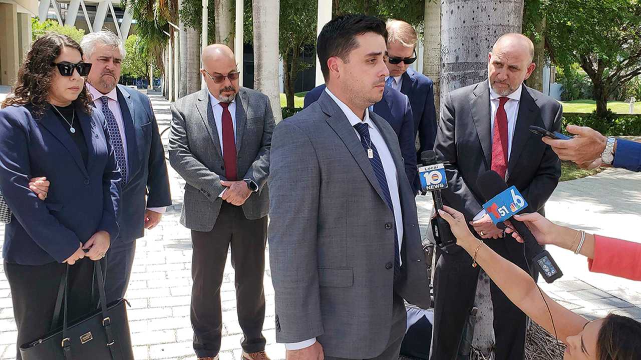 Dillon Angulo, who was seriously injured in a Florida crash involving Tesla's Autopilot driver assist technology, speaks to reporters outside the federal courthouse in Miami, Friday, Aug. 1, 2025.