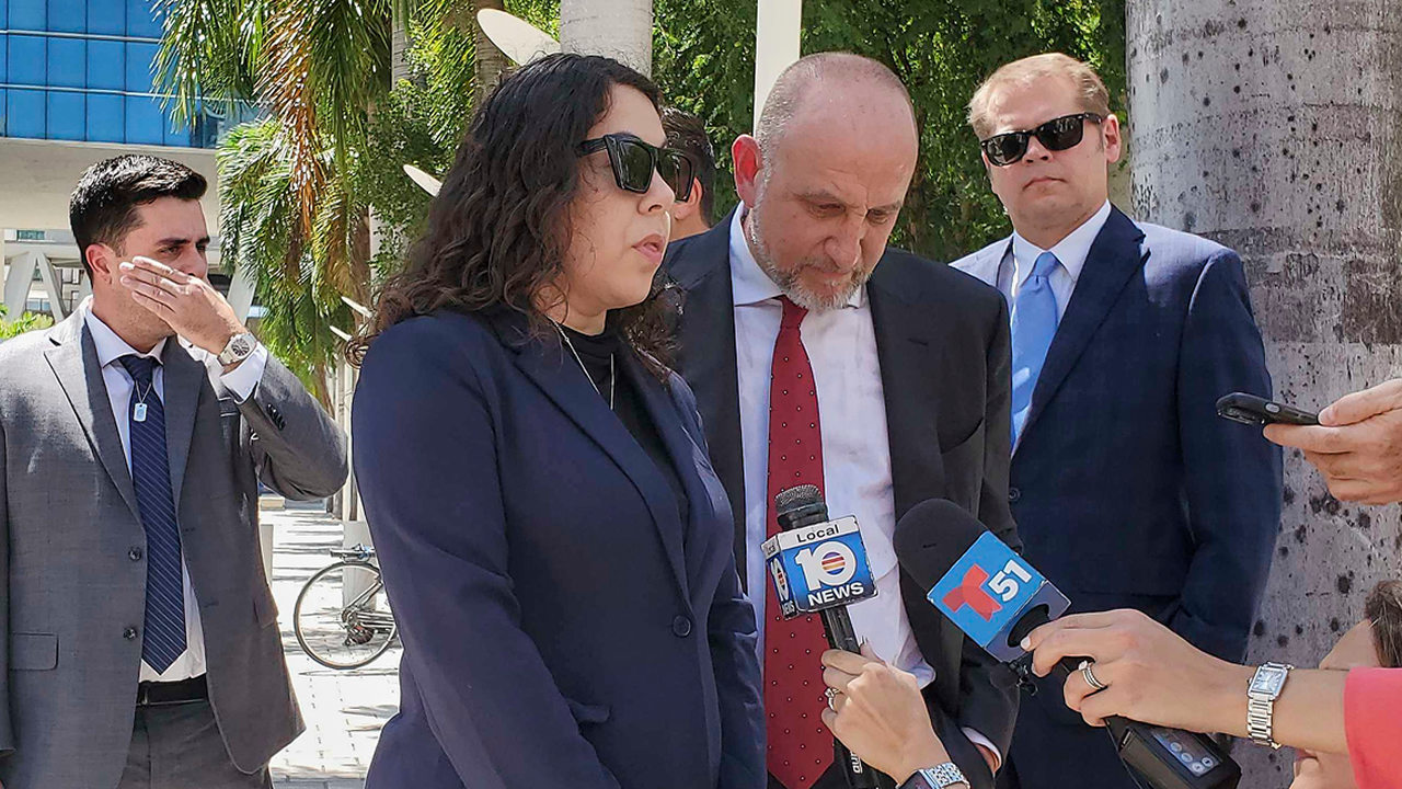 Neima Benavides, whose sister died in a Florida crash involving Tesla's Autopilot driver assist technology, speaks to reporters outside the federal courthouse in Miami, Friday, Aug. 1, 2025.