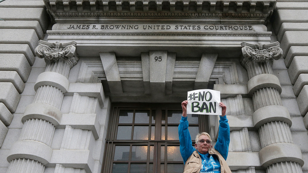 New York takes action as appeals court takes up immigration ban