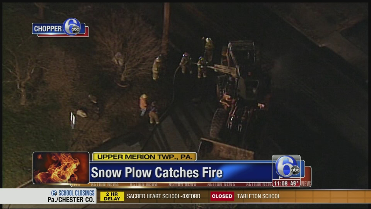 Snow plow catches fire