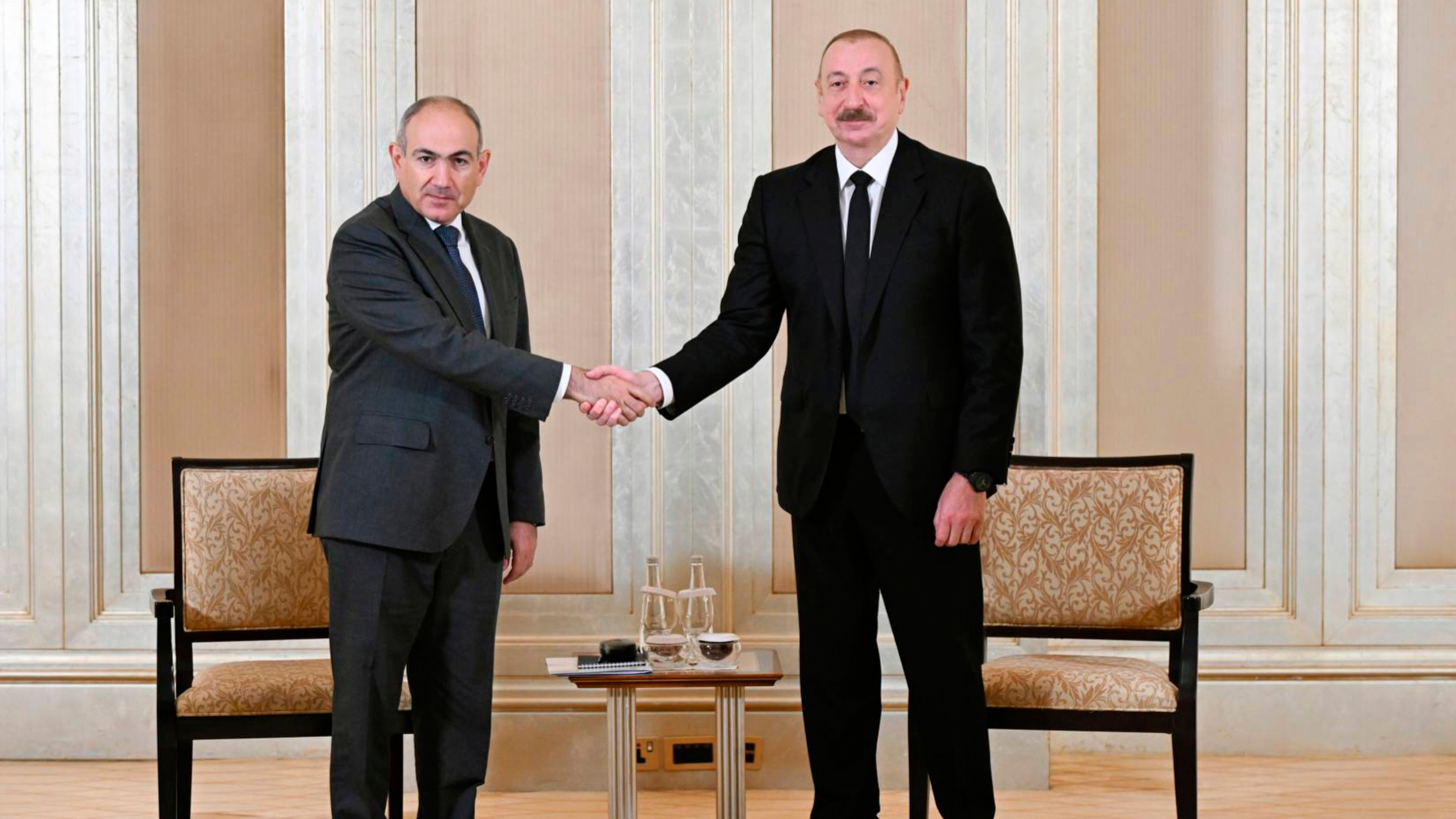 Azerbaijani President Ilham Aliyev, right, and Prime Minister of Armenia Nikol Pashinyan pose for a photo prior to their talks in Abu Dhabi, United Arab Emirates.