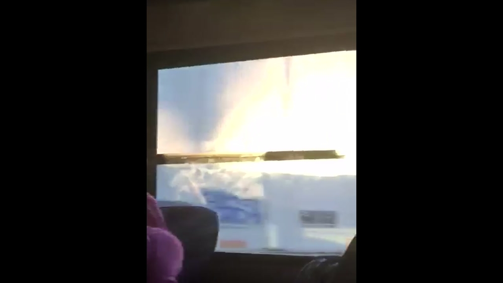 Raw video as the train passes near the bus