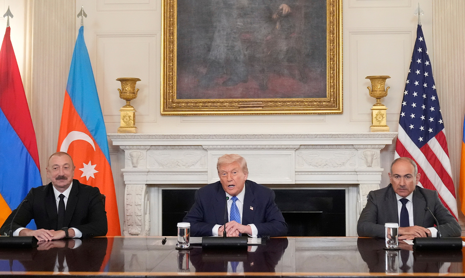 President Donald Trump, center, sits with Azerbaijan's President Ilham Aliyev, left, and Armenia's Prime Minister Nikol Pashinyan, Friday, Aug. 8, 2025, at the at White House.