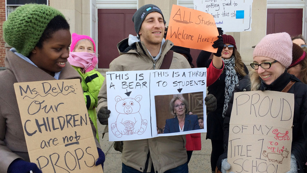 Betsy DeVos' first public school visit met with protests
