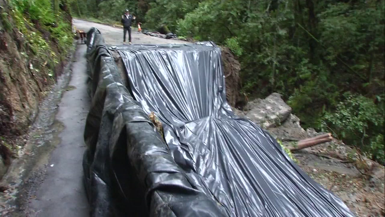 Lexington Reservoir reaches capacity, spill over and road damage 