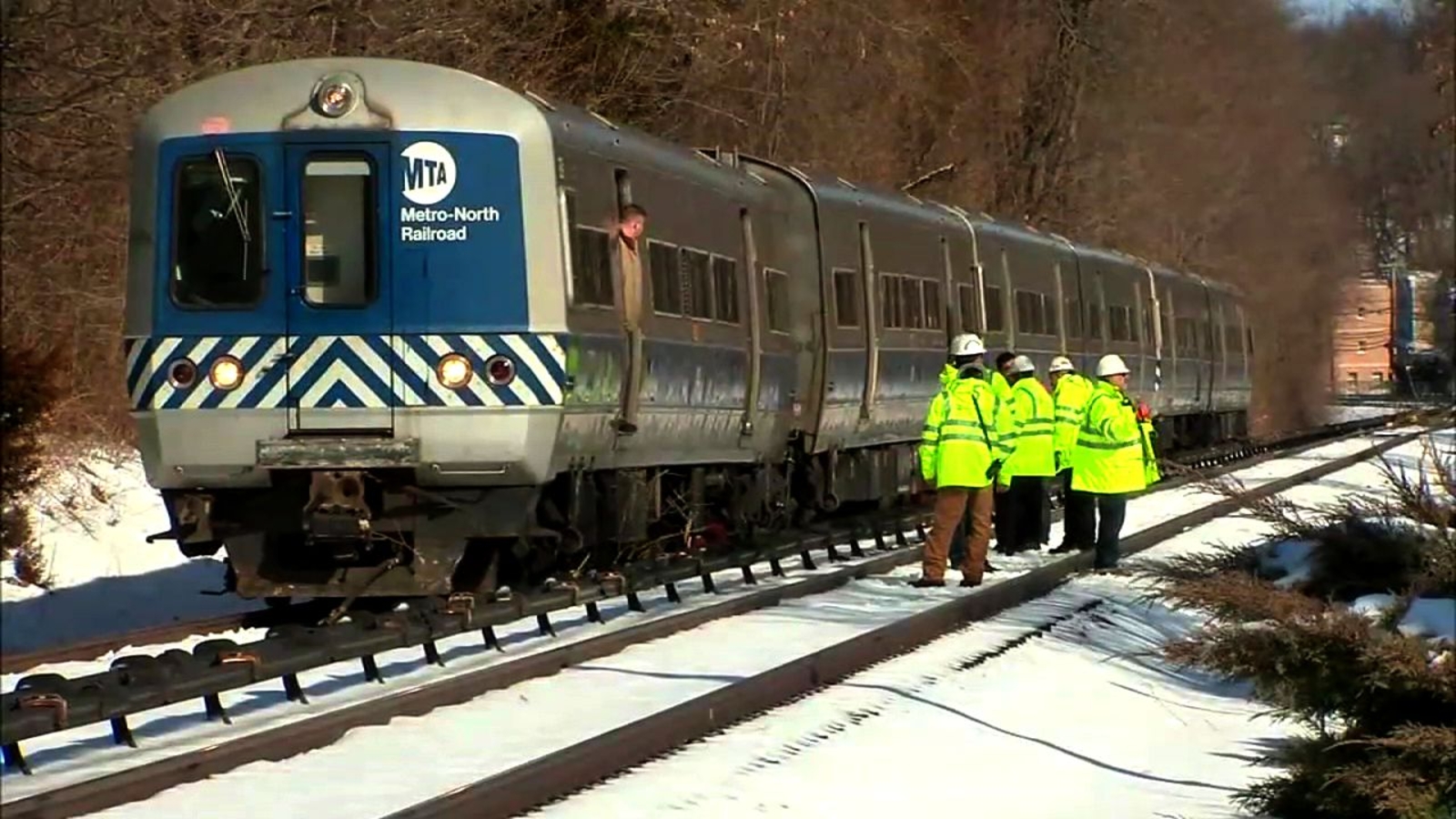 First car of MetroNorth train derails after striking tree on tracks in