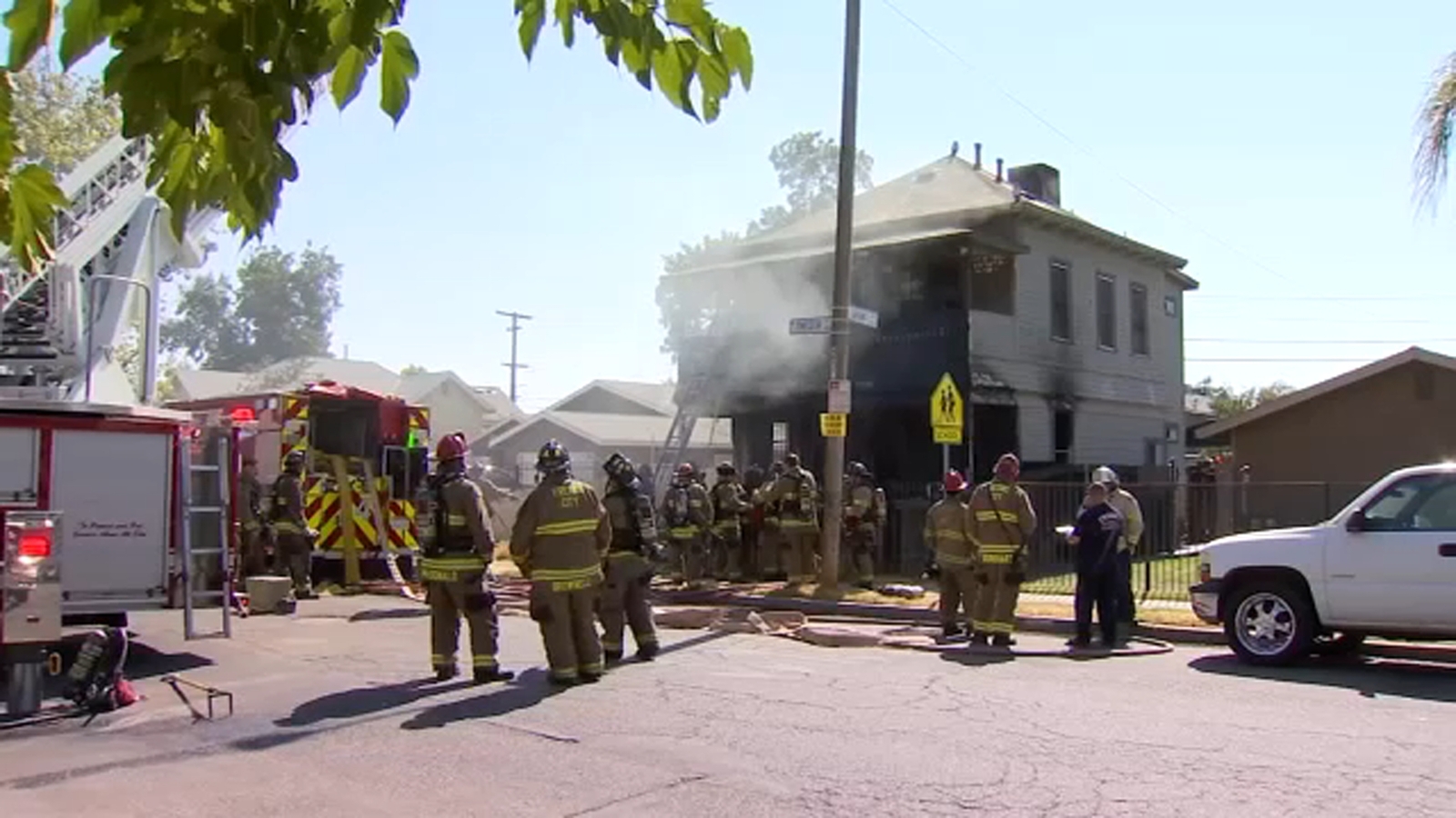 5 escape fast moving central Fresno house fire that displaced family of ...