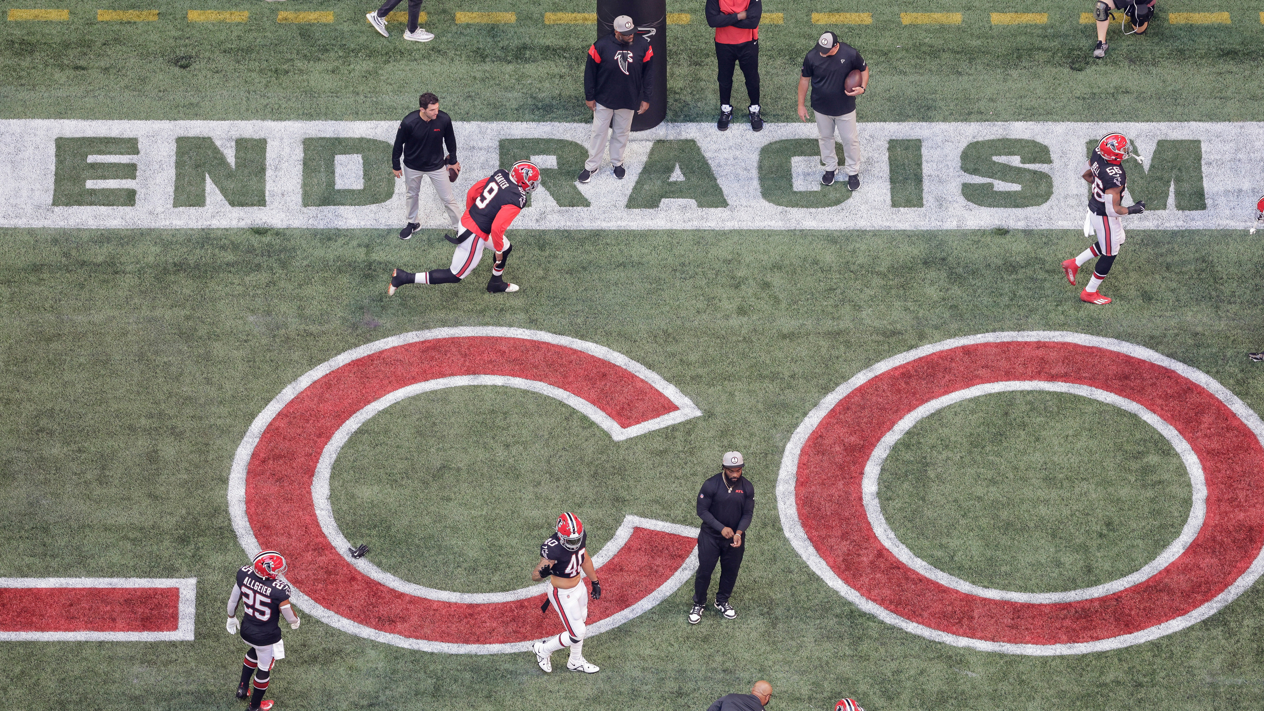 The Atlanta Falcons warm up in the endzone prior to an NFL football game against the San Francisco 49ers, Oct. 16, 2022, in Atlanta.