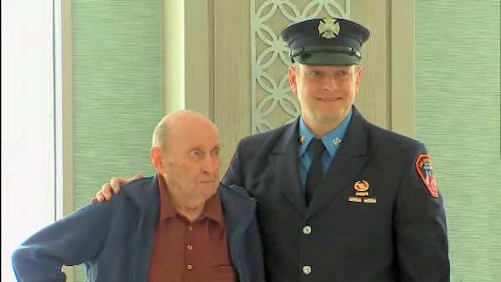 Firefighter re-united with man he saved