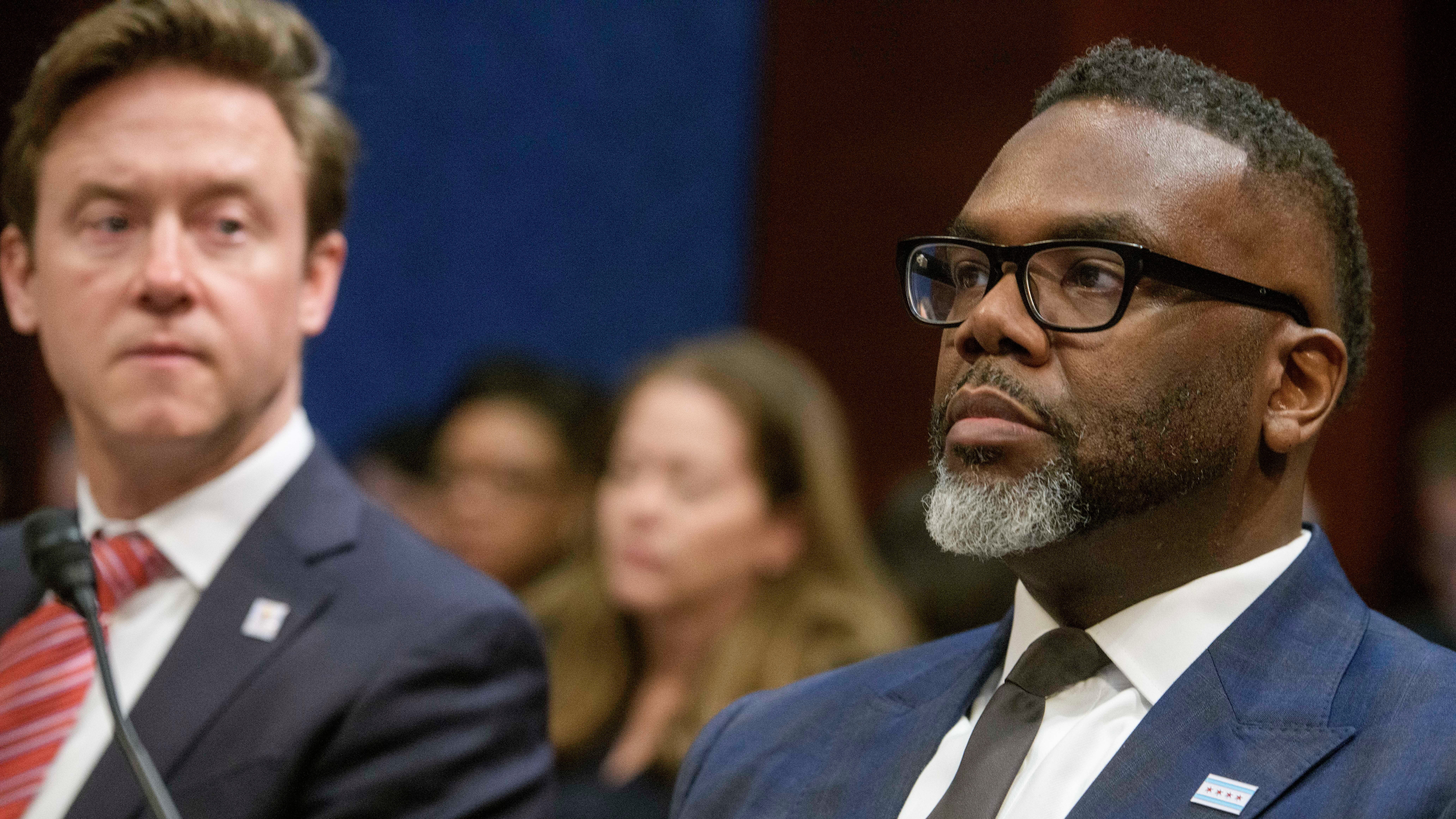 Denver Mayor Mike Johnston and Chicago Mayor Brandon Johnson sit during a House Committee hearing with Sanctuary City Mayors on Capitol Hill, March 5, 2025, in Washington.