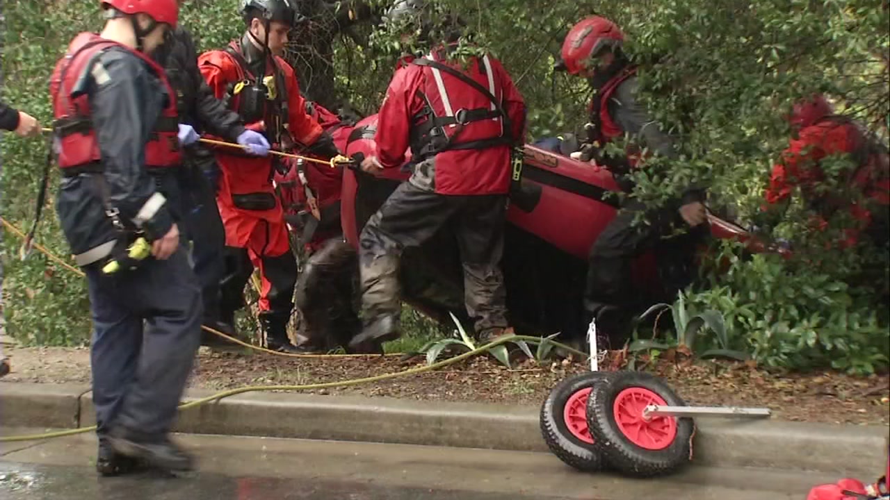 Firefighters rescue people from rising Coyote Creek in San Jose